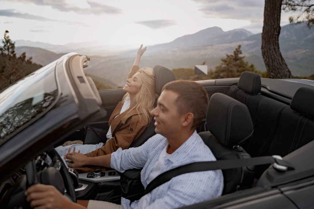 Happy couple in love,  enjoying car rental in albania.