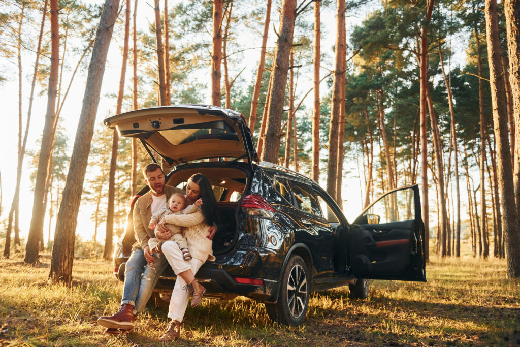 Happy family in the forest.