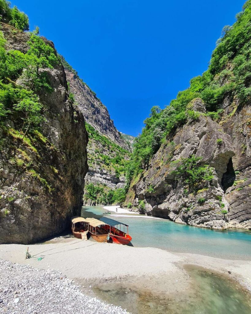 clean and calm waters of lake koman  