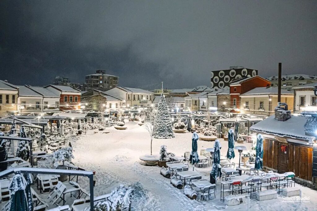 snow covering streets in the center of korca city